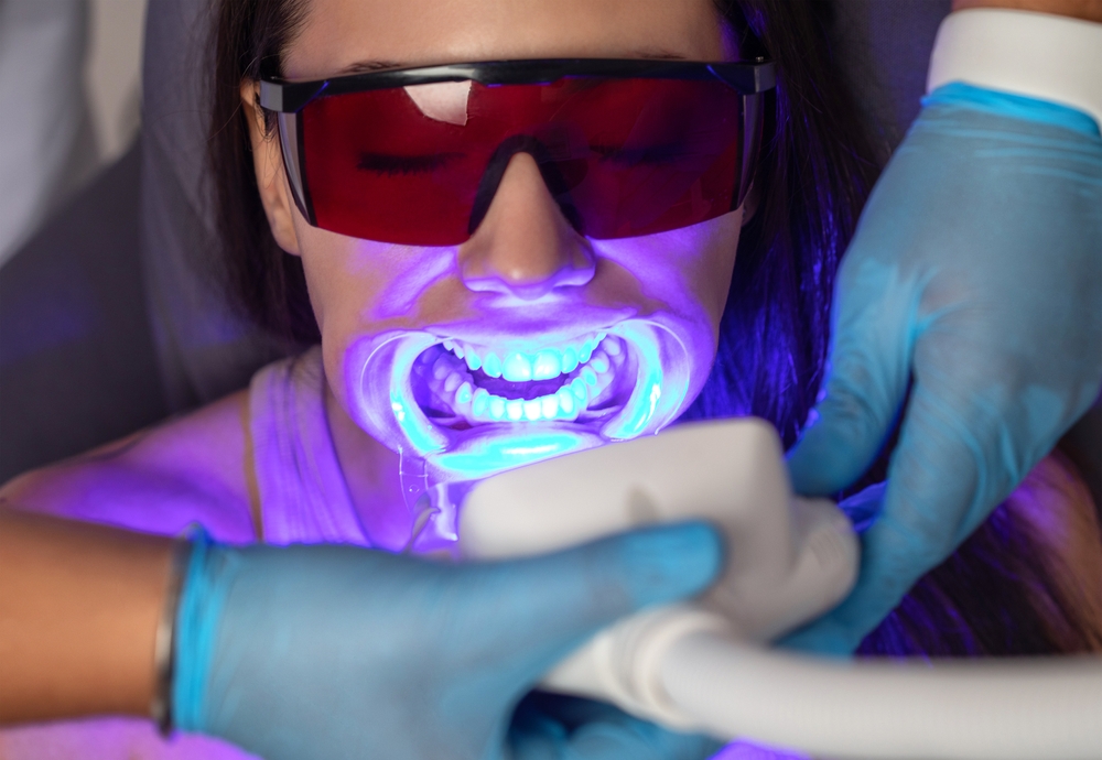 In-Office LED Whitening Treatment, Hampton Roads Patient undergoing an in-office LED teeth whitening treatment at a Hampton Roads dental office