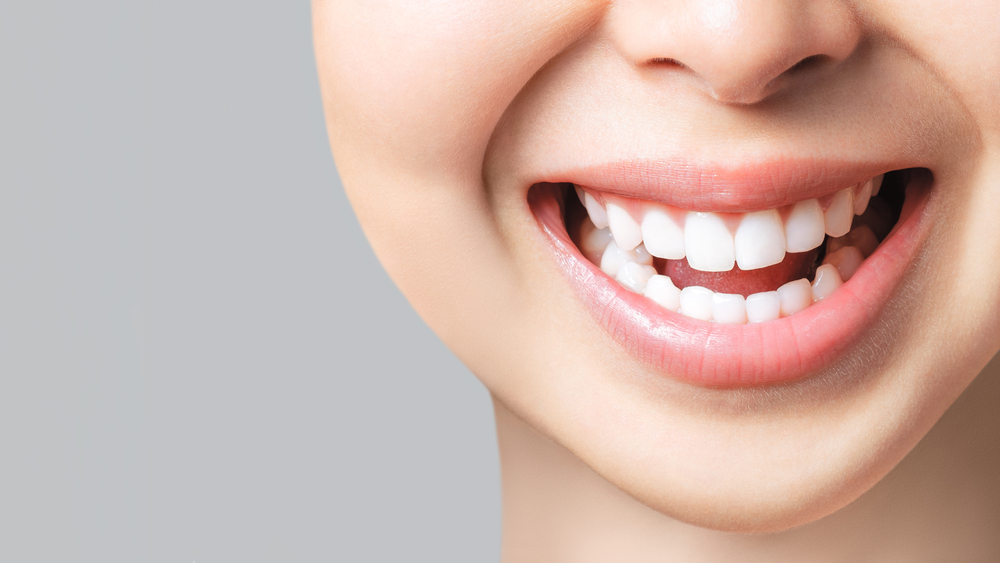 Close-up of a healthy, bright smile achieved through a smile makeover in Virginia Beach 
