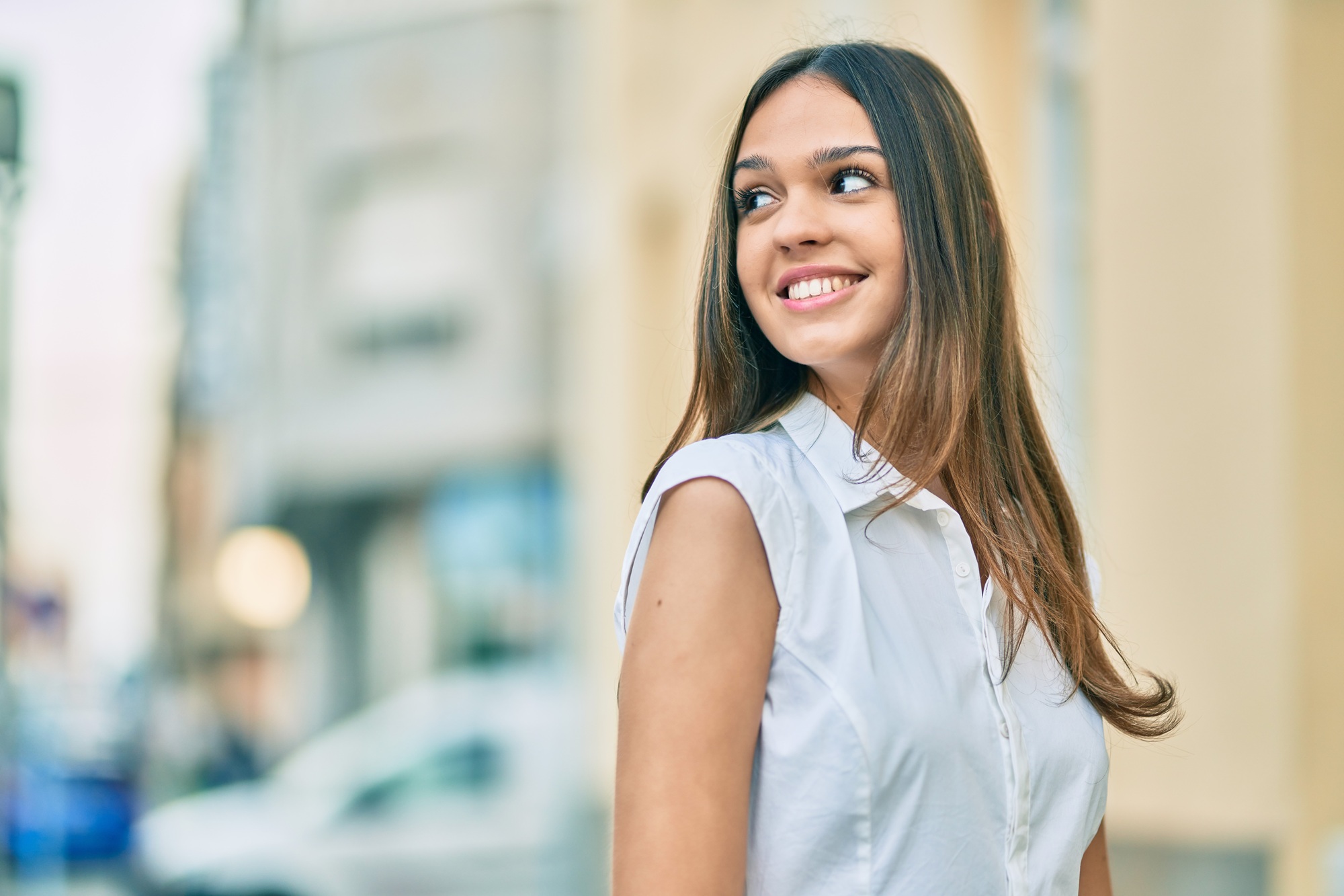 Woman with a healthy smile outdoors in the Virginia Beach community 