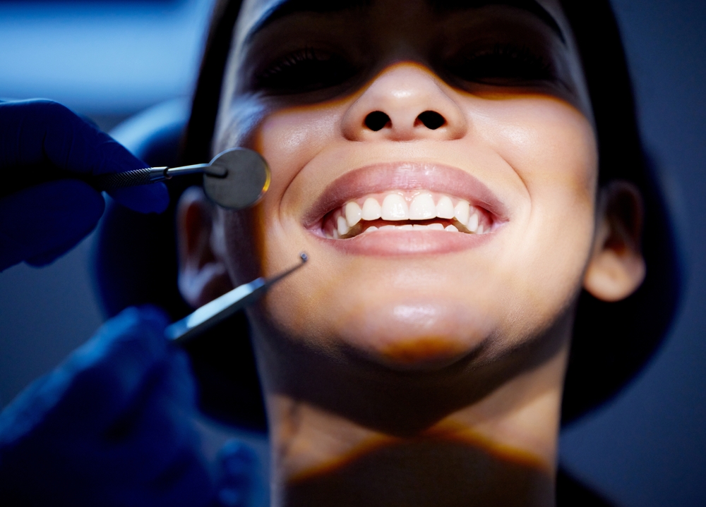 Dental exam close up at our Norfolk dental office Close up of a patient's smile during a dental exam at our Norfolk, VA office