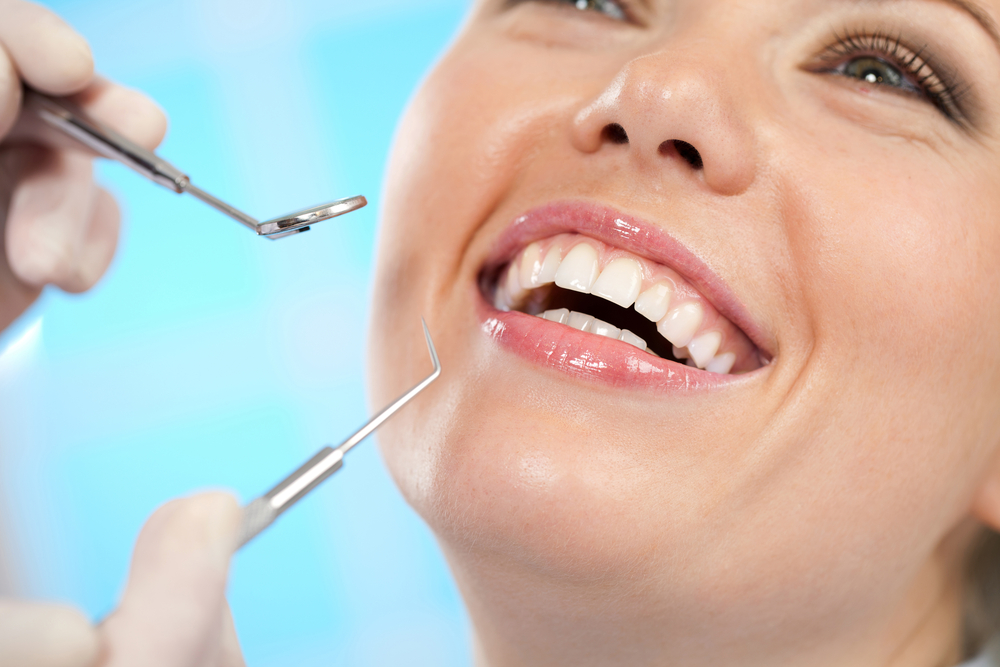 Dental exam close up at our Norfolk dental office Close up of a patient's smile during a dental exam at our Norfolk, VA office